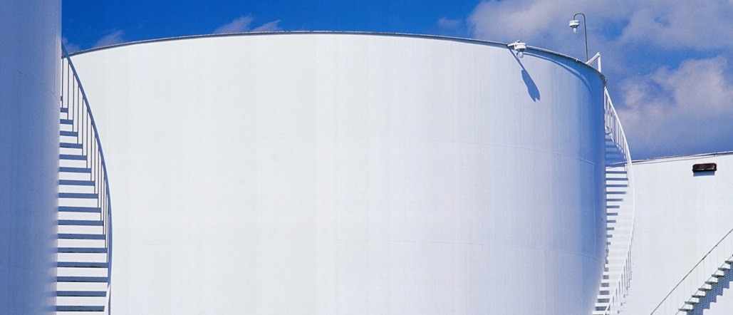 Outdoor storage tanks on overcast day