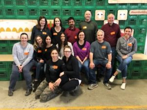 Liberty Mutual employees volunteering at the Daily Bread Food Bank