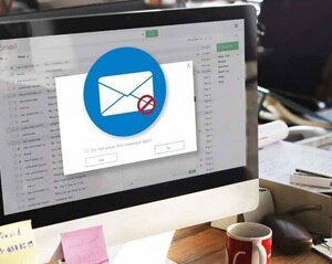 Spam email on desktop screen