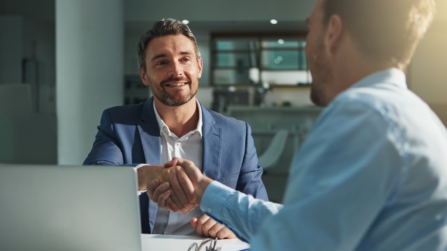 Two businessmen shaking hands